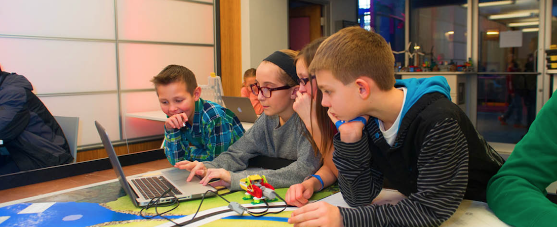 Kids activities, such as children programming a robot in this photo, can be done at Science City.